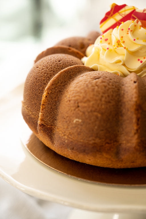 Pumpkin Pound Cake with a swirl of classic French Buttercream.